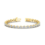 Load image into Gallery viewer, east-west-pear-diamond-tennis-bracelet-in-yellow-gold-FDBRC11577-nl-yg.jpg?v=1776416331