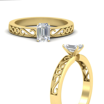 emerald-cut-filigree-single-stone-engagement-ring-in-yellow-gold-FDENS3289EMRANGLE3-NL-YG.jpg?v=1763370584