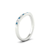 Load image into Gallery viewer, flush-set-blue-topaz-curved-wedding-band-in-white-gold-fdens2255bgicbltoangle2-nl-wg-ws4.jpg?v=1776142549