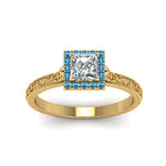 Load image into Gallery viewer, hand-engraved-princess-cut-halo-diamond-engagement-ring-with-blue-topaz-in-yellow-gold-FD8588PRRGICBLTOANGLE5-NL-YG_47c25fc3-9e13-47b6-825b-c7407586c99b?v=1757589545