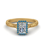 Load image into Gallery viewer, hand-engraved-radiant-cut-halo-diamond-engagement-ring-with-blue-topaz-in-yellow-gold-FD8588RARGICBLTO-NL-YG?v=1757588442