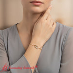 Load image into Gallery viewer, heart-interlocked-chain-bracelet-yellow-gold-fdbrc8649-model