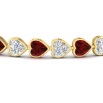 Load image into Gallery viewer, heart-shaped-diamond-bezel-tennis-bracelet-10-40-carat-with-ruby-in-yellow-gold-fdbrc10581htgrudrangle2-10-40-ct-nl-yg