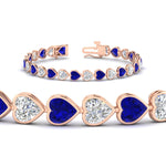 Load image into Gallery viewer, heart-shaped-diamond-bezel-tennis-bracelet-10-40-carat-with-sapphire-in-rose-gold-fdbrc10581htgsablangle2-10-40-ct-nl-rg