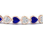 Load image into Gallery viewer, heart-shaped-diamond-bezel-tennis-bracelet-10-40-carat-with-sapphire-in-rose-gold-fdbrc10581htgsablangle2-10-40-ct-nl-rg