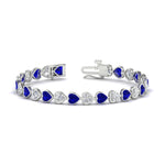 Load image into Gallery viewer, heart-shaped-diamond-bezel-tennis-bracelet-10-40-carat-with-sapphire-in-white-gold-fdbrc10581htgsablangle2-10-40-ct-nl-wg