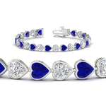 Load image into Gallery viewer, heart-shaped-diamond-bezel-tennis-bracelet-10-40-carat-with-sapphire-in-white-gold-fdbrc10581htgsablangle2-10-40-ct-nl-wg