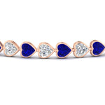 Load image into Gallery viewer, heart-shaped-diamond-bezel-tennis-bracelet-7-75-carat-with-sapphire-in-rose-gold-fdbrc10581htgsablangle2-7-75-ct-nl-rg