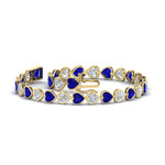 Load image into Gallery viewer, heart-shaped-diamond-bezel-tennis-bracelet-7-75-carat-with-sapphire-in-yellow-gold-fdbrc10581htgsablangle2-7-75-ct-nl-yg