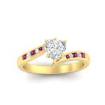 Load image into Gallery viewer, heart-shaped-diamond-swirl-channel-set-pink-sapphire-wedding-ring-in-yellow-gold-FDENS4028HTRGSADRPIANGLE5-NL-YG.jpg?v=1754995898
