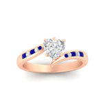 Load image into Gallery viewer, heart-shaped-diamond-swirl-channel-set-sapphire-wedding-ring-in-rose-gold-FDENS4028HTRGSABLANGLE5-NL-RG.jpg?v=1754995895