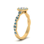 Load image into Gallery viewer, infinity-cushion-halo-diamond-engagement-ring-with-blue-topaz-in-yellow-gold-FD9126CURGICBLTOANGLE2-NL-YG_2c71359b-3fb7-4bd0-97b6-d86e5c78ced1?v=1757924891