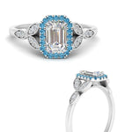 Load image into Gallery viewer, leaves-emerald-cut-halo-diamond-engagement-ring-with-blue-topaz-in-white-gold-FD9827EMRGICBLTOANGLE3-NL-WG.jpg?v=1770891203