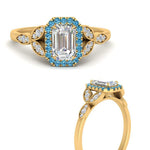 Load image into Gallery viewer, leaves-emerald-cut-halo-diamond-engagement-ring-with-blue-topaz-in-yellow-gold-FD9827EMRGICBLTOANGLE3-NL-YG.jpg?v=1770891203