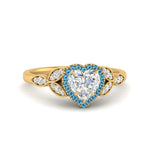 Load image into Gallery viewer, leaves-heart-shaped-halo-diamond-engagement-ring-with-blue-topaz-in-yellow-gold-FD9827HTRGICBLTO-NL-YG.jpg?v=1770891218