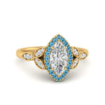 Load image into Gallery viewer, leaves-marquise-cut-halo-diamond-engagement-ring-with-blue-topaz-in-yellow-gold-FD9827MQRGICBLTO-NL-YG.jpg?v=1770891235