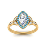 Load image into Gallery viewer, leaves-marquise-cut-halo-diamond-engagement-ring-with-blue-topaz-in-yellow-gold-FD9827MQRGICBLTOANGLE5-NL-YG_11d54b0d-e7b8-4e43-a931-22e1fb4be5cf.jpg?v=1770891368