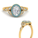 Load image into Gallery viewer, leaves-oval-shaped-halo-diamond-engagement-ring-with-blue-topaz-in-yellow-gold-FD9827OVRGICBLTOANGLE3-NL-YG.jpg?v=1770891253