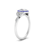 Load image into Gallery viewer, leaves-oval-shaped-halo-diamond-engagement-ring-with-sapphire-in-white-gold-FD9827OVRGSABLANGLE2-NL-WG.jpg?v=1770891254
