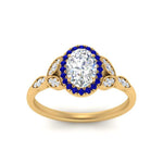 Load image into Gallery viewer, leaves-oval-shaped-halo-diamond-engagement-ring-with-sapphire-in-yellow-gold-FD9827OVRGSABLANGLE5-NL-YG.jpg?v=1770891253