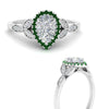 Load image into Gallery viewer, leaves-pear-shaped-halo-diamond-engagement-ring-with-emerald-in-white-gold-FD9827PERGEMGRANGLE3-NL-WG.jpg?v=1770891269