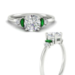 Load image into Gallery viewer, marquise-and-round-accented-emerald-engagement-ring-in-white-gold-fdenr11621rogemgrangle3-nl-wg.jpg?v=1766474362