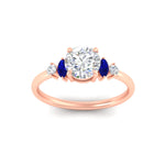 Load image into Gallery viewer, marquise-and-round-accented-sapphire-engagement-ring-in-rose-gold-fdenr11621rogsablangle5-nl-rg.jpg?v=1766474255