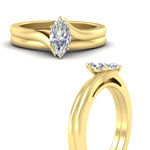 Load image into Gallery viewer, marquise-cut-diamond-serenity-solitaire-wedding-set-in-yellow-gold-fdens1020mqangle3-nl-yg?v=1764307632