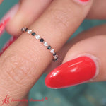 Load image into Gallery viewer, minimalist-0.50-ct-round-cut-shared-prong-diamond-eternity-band-with-black-diamond-in-rose-gold-FDEWB9477