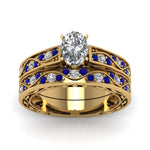 Load image into Gallery viewer, oval-cut-antique-filigree-wedding-ring-set-with-sapphire-in-yellow-gold-FDENS3543OVGSABLANGLE5-NL-YG