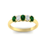 Load image into Gallery viewer, oval-cut-five-stone-wedding-emerald-band-0.50-carat-in-yellow-gold-fdwb8008ovgemgrangle5-0.50ct-nl-yg.jpg?v=1773047588