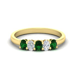 Load image into Gallery viewer, oval-cut-five-stone-wedding-emerald-band-0.50-carat-in-yellow-gold-fdwb8008ovgemgrsleep-0.50ct-nl-yg.jpg?v=1773047588