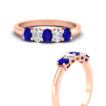 Load image into Gallery viewer, oval-cut-five-stone-wedding-sapphire-band-0.50-carat-in-rose-gold-fdwb8008ovgsablangle3-0.50ct-nl-rg.jpg?v=1773047588