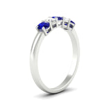 Load image into Gallery viewer, oval-cut-five-stone-wedding-sapphire-band-0.50-carat-in-white-gold-fdwb8008ovgsablangle2-0.50ct-nl-wg_4004080b-9224-4d08-8226-0dd973ae2253.jpg?v=1773047587