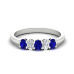 Load image into Gallery viewer, oval-cut-five-stone-wedding-sapphire-band-0.50-carat-in-white-gold-fdwb8008ovgsablsleep-0.50ct-nl-wg_a613d00b-1c08-46cc-bc8a-3abc429b2b2f.jpg?v=1773047587