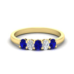Load image into Gallery viewer, oval-cut-five-stone-wedding-sapphire-band-0.50-carat-in-yellow-gold-fdwb8008ovgsablsleep-0.50ct-nl-yg.jpg?v=1773047588