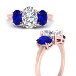 Load image into Gallery viewer, oval-sapphire-3-stone-basket-engagement-ring-in-rose-gold-FD10416OVRGSABLANGLE3-NL-RG_55f34e9b-5f0e-452b-9f8e-250fa0adf337