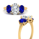 Load image into Gallery viewer, oval-sapphire-3-stone-basket-engagement-ring-in-yellow-gold-FD10416OVRGSABLANGLE3-NL-YG