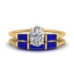 Load image into Gallery viewer, oval-shaped-bar-set-sapphire-ring-with-matching-3-baguette-wedding-band-in-yellow-gold-FDENS100OVGSABL-NL-YG