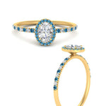 Load image into Gallery viewer, oval-shaped-blue-topaz-halo-petite-engagement-ring-in-yellow-gold-FD8523OVRGICBLTOANGLE3-NL-YG