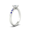 Load image into Gallery viewer, oval-shaped-diamond-swirl-channel-set-sapphire-wedding-ring-in-white-gold-FDENS4028OVRGSABLANGLE2-NL-WG_732209b3-da88-419d-bca2-725445637350.jpg?v=1754996109
