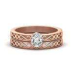 Load image into Gallery viewer, oval-shaped-filigree-single-stone-diamond-wedding-ring-set-in-rose-gold-FDENS3289OV-NL-RG.jpg?v=1763371070