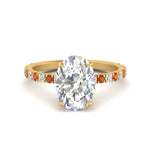 Load image into Gallery viewer, oval-shaped-hidden-halo-diamond-engagement-ring-with-orange-sapphire-in-yellow-gold-FD10801OVRGSOR-NL-YG.webp?v=1767330554
