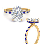 Load image into Gallery viewer, oval-shaped-hidden-halo-diamond-engagement-ring-with-sapphire-in-yellow-gold-FD10801OVRGSABLANGLE3-NL-YG