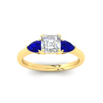 Load image into Gallery viewer, pear-diamond-cathedral-asscher-cut-engagement-ring-with-sapphire-in-yellow-gold-fdenr9210asrgsablangle5-nl-yg.jpg?v=1758259331