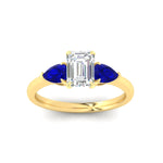 Load image into Gallery viewer, pear-diamond-cathedral-emerald-cut-engagement-ring-with-sapphire-in-yellow-gold-fdenr9210emrgsablangle5-nl-yg
