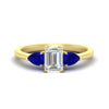 Load image into Gallery viewer, pear-diamond-cathedral-emerald-cut-engagement-ring-with-sapphire-in-yellow-gold-fdenr9210emrgsablsleep-nl-yg_1681d800-c4d8-4bc4-8244-049e68cae156.jpg?v=1758097711