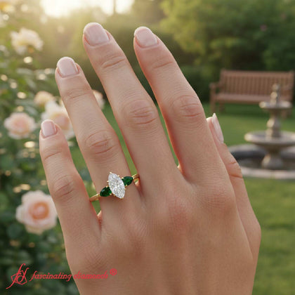 pear-diamond-cathedral-marquise-cut-engagement-ring-with-emerald-in-yellow-gold-fdenr9210mq