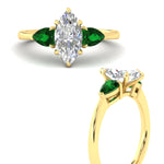 Load image into Gallery viewer, pear-diamond-cathedral-marquise-cut-engagement-ring-with-emerald-in-yellow-gold-fdenr9210mqrgemgrangle3-nl-yg
