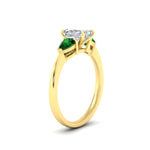 Load image into Gallery viewer, pear-diamond-cathedral-radiant-cut-engagement-ring-with-emerald-in-yellow-gold-fdenr9210rargemgrangle2-nl-yg